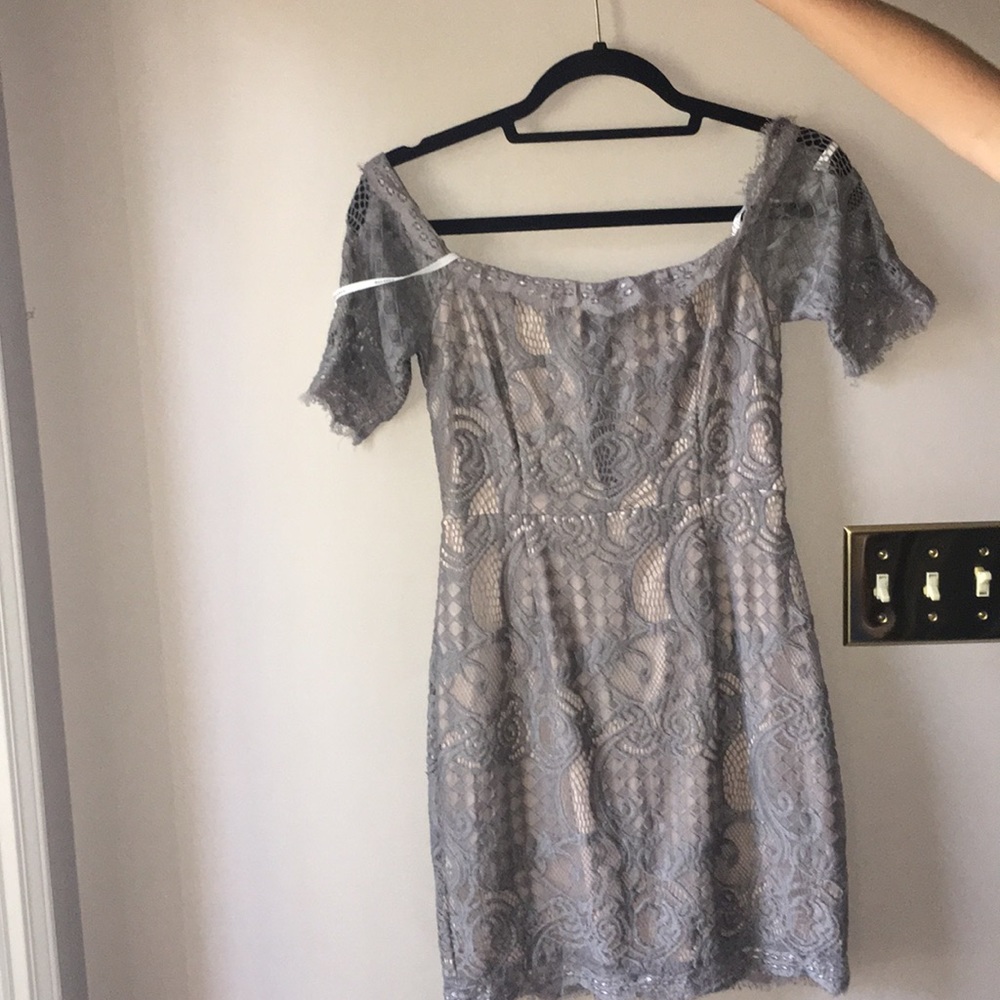 Gray and lacy, off the shoulder dress. Worn once.